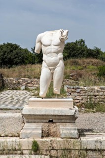 Collosal torso of a naked male god in the Hadrian's Bath of Aphrodisias in Aydin