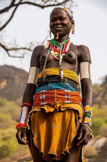 Traditional dressed young girl from the Laarim tribe