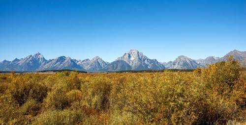 Mountain panorama with Mount Moran and Grand Teton peaks