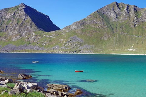 Crystal clear bay with boat