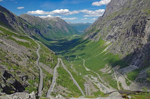 Mountain road winds up the mountain in serpentines