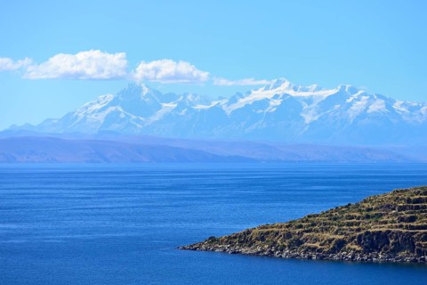 View across the lake to the Cordillera Real mountain range