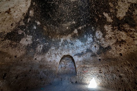 Cave system in the Takht-e Rostam stupa monastery complex