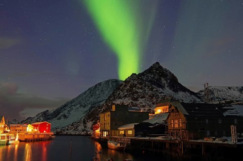 Small harbour with illuminated houses