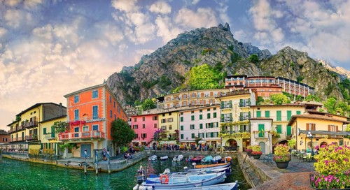 Idyllic fishing village and harbour with colourful houses and boats