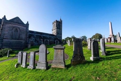 Old town cemetery with Holy rude church in the background