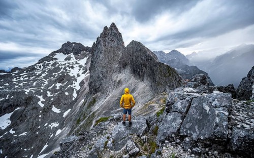 Hiker at the summit of the Westliche Toerlspitze