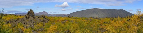 Tuff ring Hverfjall and lava formation of Dimmuborgir with autumn coloured birch vegetation