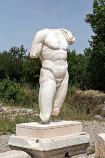 Collosal torso of a naked male god in the Hadrian's Bath of Aphrodisias in Aydin