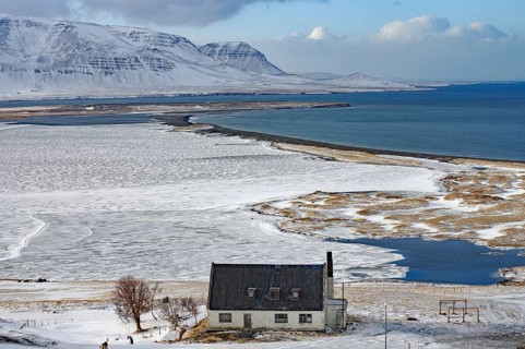Abandoned house in front of wide bay