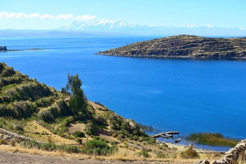 View across the lake to the Cordillera Real mountain range