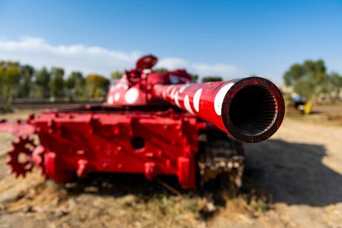 Old soviet tank coloured in funky colours