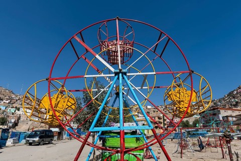 Old fashioned playground at the Sakhi Shah-e Mardan Shrine or Ziyarat-e Sakhi