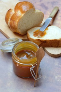 French caramel cream in glass and yeast plait