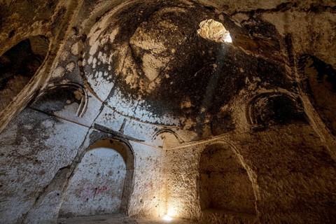 Cave system in the Takht-e Rostam stupa monastery complex