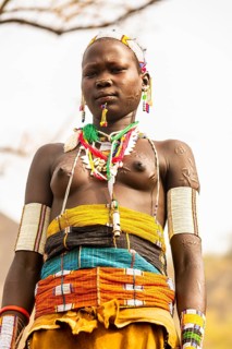 Traditional dressed young girl from the Laarim tribe