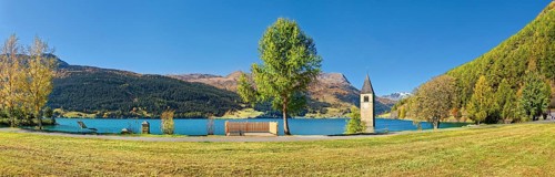 Church tower in Lake Reschen Panorama