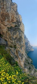 Steep wall of the old coastal road and hiking trail Via Ponale
