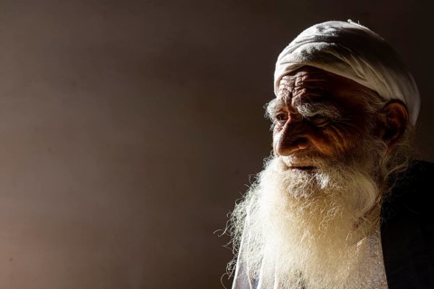 Sufi priest studying