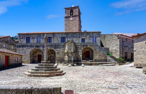 Main square with former city hall and bell tower