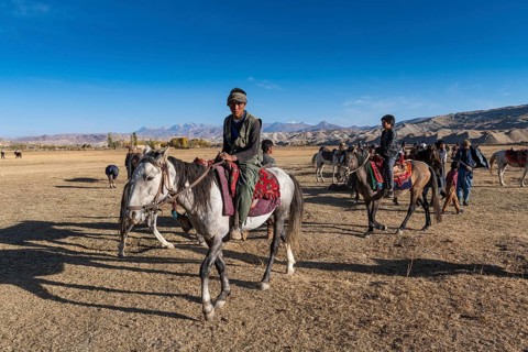 Men practising a traditional Buzkashi game