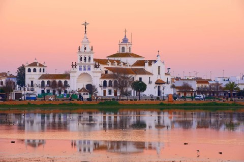 El Rocio village and hermitage at sunset