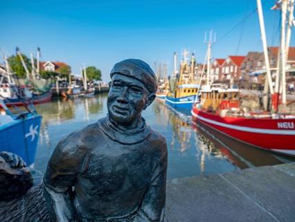 Bronze sculpture of a fisherman