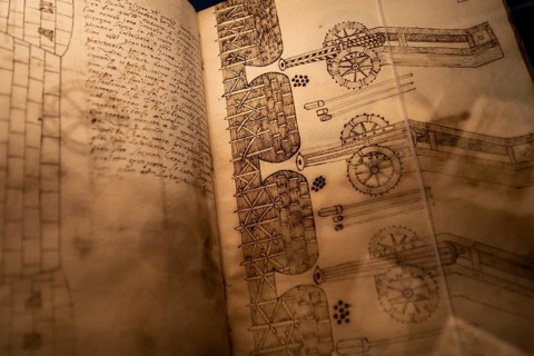 Antique book with technical calculations about cannons