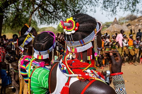 Traditional dressed young girls practising local dances
