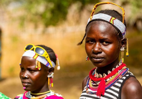 Traditional dressed young girls from the Laarim tribe