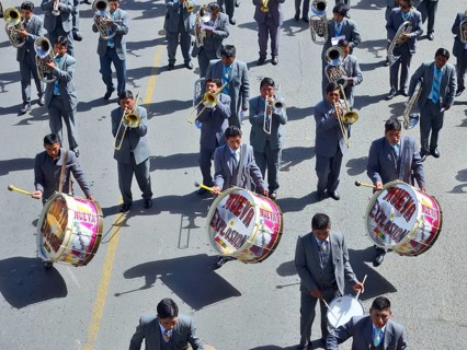 Music group with timpani and trumpets during a parade