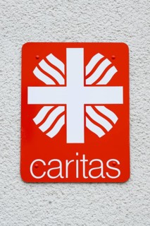 Sign and logo Caritas