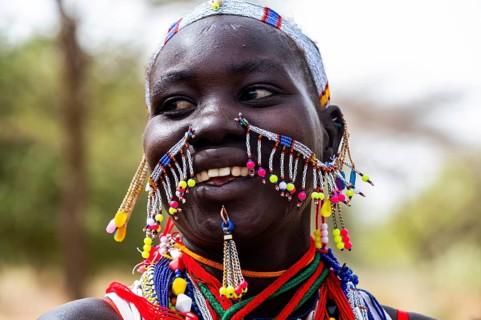 Traditional dressed young girl from the Laarim tribe