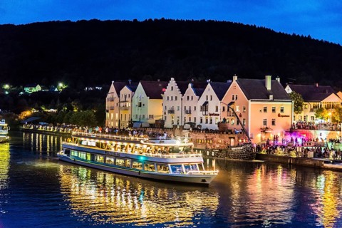 Solstice celebration with ship parade and fireworks