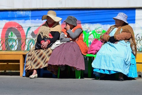 Seated spectators at a parade