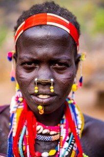 Traditional dressed young girl from the Laarim tribe
