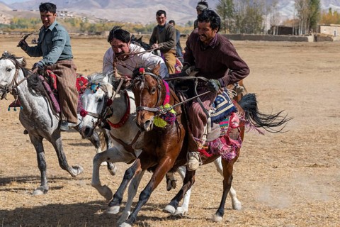 Men practising a traditional Buzkashi game