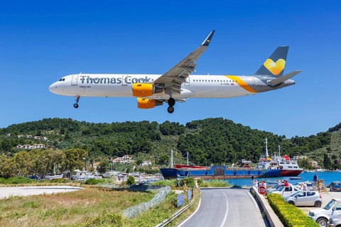 A Thomas Cook Airlines Airbus A321 aircraft with registration G-TCDE at Skiathos Airport