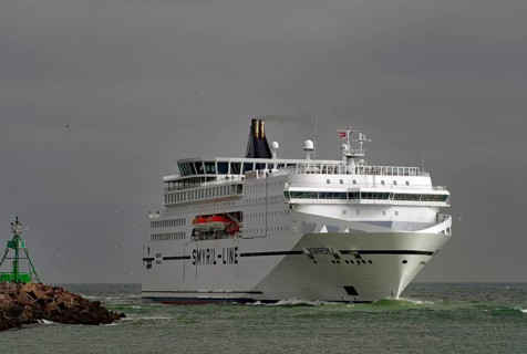Passenger ship entering a port