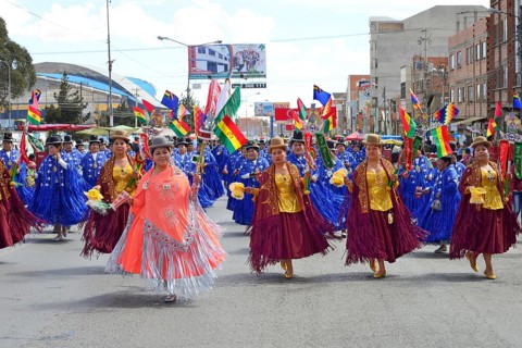 Dance group in traditional costumes at a parade