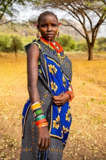 Traditional dressed young girl from the Laarim tribe