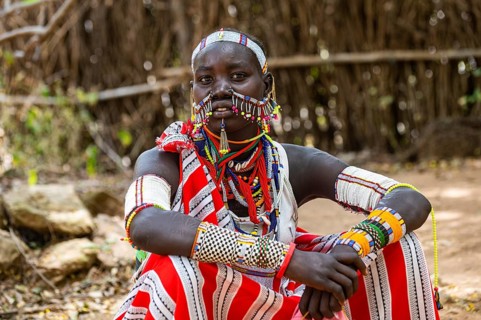 Traditional dressed young girl from the Laarim tribe