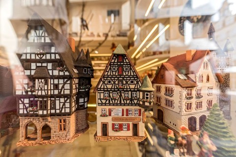 Models of historic German half-timbered houses in a shop window