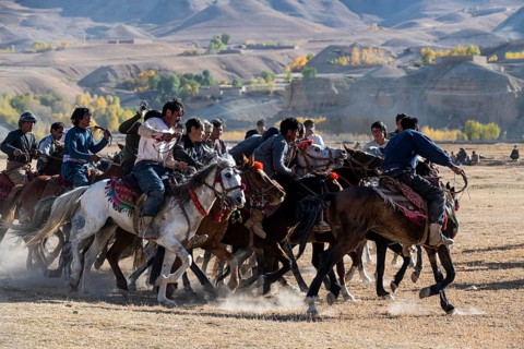 Men practising a traditional Buzkashi game