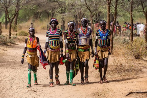Traditional dressed young girls from the Laarim tribe