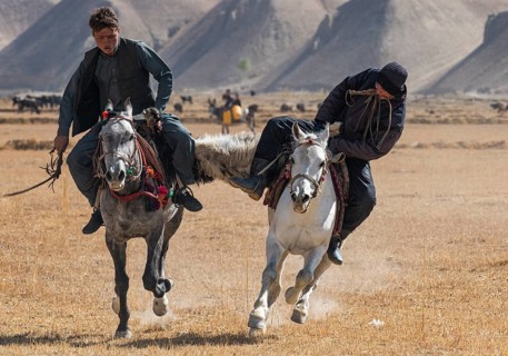 Men practising a traditional Buzkashi game