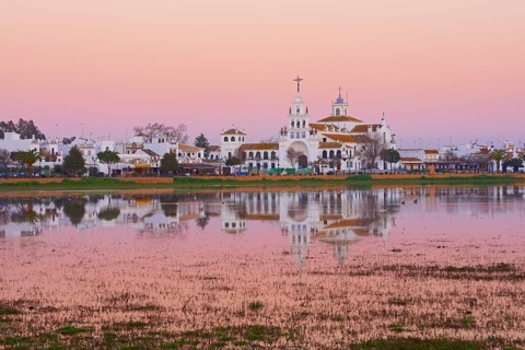 El Rocio village and hermitage at sunset