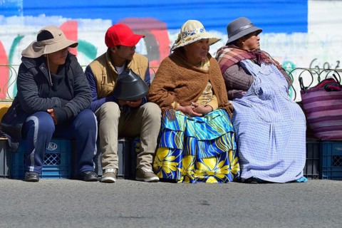 Seated spectators at a parade