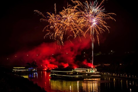 Solstice celebration with ship parade and fireworks