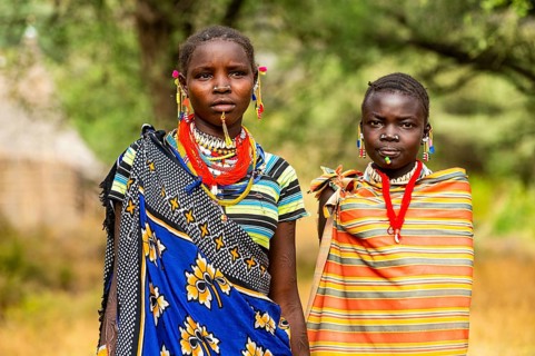 Traditional dressed young girls from the Laarim tribe